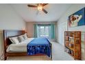 Spacious main bedroom with neutral walls, ceiling fan, large window, and ample closet space at 367 Countryside Key Blvd, Oldsmar, FL 34677