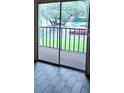 Balcony door leading to outdoor space perfect for relaxing and enjoying the weather at 14442 Reuter Strasse Cir # 812, Tampa, FL 33613
