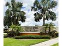 Community sign surrounded by Palm Trees in the Brentwood Hills community at 1706 Erin Brooke Dr, Valrico, FL 33594