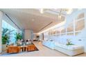 Elegant lobby features modern decor, comfortable seating, marble reception desk, and sophisticated lighting at 2912 W Santiago St # 803, Tampa, FL 33629