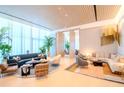 Inviting lounge area with stylish seating, chic decor, and abundant natural light creating a relaxing atmosphere at 2912 W Santiago St # 803, Tampa, FL 33629