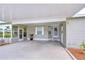 A covered carport provides ample parking with convenient access to the home and lanai at 37526 New Horizons Blvd, Zephyrhills, FL 33541