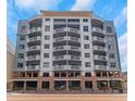 Stylish condominium building boasts multiple floors, each with private balconies and city views at 1108 N Franklin St # 602, Tampa, FL 33602