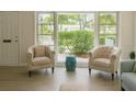 Cozy sitting area by a large window at 2328 Harn Blvd, Clearwater, FL 33764