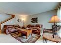 Comfortable living room with leather furniture and a warm, inviting atmosphere at 2898 Thaxton Dr # 76, Palm Harbor, FL 34684