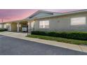 Charming one-story villa featuring a covered carport, well-maintained landscaping, and a welcoming entrance at 12400 Park Blvd # 519, Seminole, FL 33772