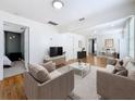 Inviting living room with stylish furnishings, hardwood floors, and neutral decor at 3327 25Th N St, St Petersburg, FL 33713