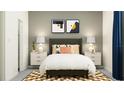 Cozy bedroom featuring stylish decor, modern nightstands, and a plush upholstered headboard at 11828 Sparkling Topaz Cv, Parrish, FL 34219