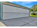 Closed airplane hangar showcasing its sturdy construction and secure design for aircraft storage at 11908 Pilot Country Dr, Spring Hill, FL 34610