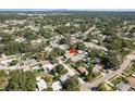 Aerial view showcasing property's location within a lush, tree-filled neighborhood at 6658 Stewart N Ave, St Petersburg, FL 33702