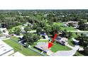 Aerial view of a home featuring a private pool and expansive backyard at 800 Embassy Rd, Largo, FL 33771