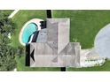 Aerial view of home with a pool, showcasing its layout and outdoor space at 800 Embassy Rd, Largo, FL 33771