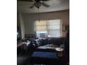 Inviting living room features a sofa, natural light and a window AC unit at 516 7Th W Ave # 1, Palmetto, FL 34221