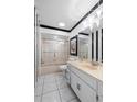 Bathroom featuring black and white striped walls and modern fixtures at 1617 Leland Dr, Sun City Center, FL 33573