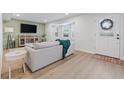Bright and airy living room with modern decor and a cozy seating arrangement at 4915 Stolls Ave, Tampa, FL 33615