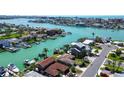 Waterfront homes offer easy water access, boat docks and stunning water views near the city at 501 Crystal Dr, Madeira Beach, FL 33708