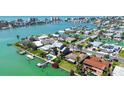 Waterfront community with canal access, private docks, and scenic views of the surrounding area at 501 Crystal Dr, Madeira Beach, FL 33708
