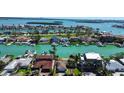 Waterfront homes offer beautiful views of boats docked along canals in this desirable neighborhood at 501 Crystal Dr, Madeira Beach, FL 33708