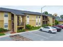 Well-maintained two-story condo building with private balconies and ample parking at 12261 Sailwinds Dr # 203, Largo, FL 33773
