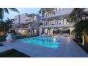 Modern backyard pool and lounge area for a stylish home at 324 Capri Blvd, Treasure Island, FL 33706