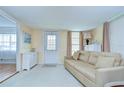 Cozy living room with comfortable furnishings and bright natural light at 35014 Carl Ave, Zephyrhills, FL 33541