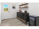 Coffee Bar Nook with cabinets and decor at 380 Colony Point S Rd, St Petersburg, FL 33705