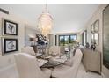 Bright and airy dining room with views of the golf course at 4 Belleview Blvd # 305, Belleair, FL 33756