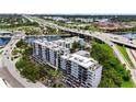 An aerial view of the condo community surrounded by lush greenery with easy highway access at 201 W Laurel St # 308, Tampa, FL 33602