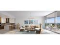 Bright living room with sleek modern finishes, open floor plan, floor-to-ceiling windows, and scenic views at 235 1St S Ave # 3104, St Petersburg, FL 33701