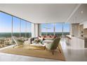 Bright, modern living room with floor-to-ceiling windows and stunning city views at 235 1St S Ave # 3206, St Petersburg, FL 33701
