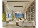 Bright living area features floor-to-ceiling windows and a cozy seating arrangement at 235 1St S Ave # 4101, St Petersburg, FL 33701