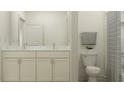 Bathroom with white cabinets, marble countertop, dual sinks, tiled shower with modern fixtures at 9360 Gladsome Dr, Land O Lakes, FL 34637