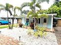 Inviting single-story home with landscaped front yard and charming curb appeal at 111 12Th Ave, Indian Rocks Beach, FL 33785