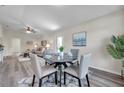 Cozy dining area with a stylish table set and views of the living room at 1561 S Martin Luther King Jr Ave, Clearwater, FL 33756