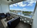 Relaxing balcony view of the bay, with comfortable seating, perfect for enjoying the sunshine and sea breeze at 1365 Snell Isle Ne Blvd # 6E, St Petersburg, FL 33704