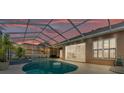Relaxing screened-in pool area with covered lanai, perfect for outdoor entertaining at 2202 Hickory Ridge Dr, Valrico, FL 33596