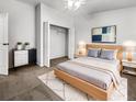 Comfortable bedroom with stylish décor, including a cozy bed, closet space, and soft rug at 2908 Lockwood Meadows Blvd, Sarasota, FL 34234