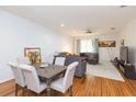 Open-concept living area with sleek flooring and modern decor at 18136 Nassau Point Dr, Tampa, FL 33647