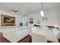 Bright and airy living room features modern furnishings and hardwood floors at 4221 W Spruce St # 2328, Tampa, FL 33607