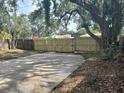 Large fenced backyard with a gate for added security and privacy at 6427 2Nd S Ave, St Petersburg, FL 33707
