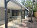 The home has a convenient covered carport with a brick walkway along the side of the home at 6427 2Nd S Ave, St Petersburg, FL 33707
