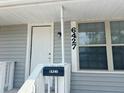 Inviting front door with visible address numbers and a classic mailbox, exuding curb appeal at 6427 2Nd S Ave, St Petersburg, FL 33707