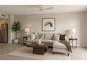 Inviting living room with a comfortable sectional sofa, stylish decor, and ample natural light at 2621 Cove Cay Dr # 206, Clearwater, FL 33760