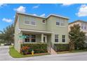 Well-maintained home featuring a two-story facade and lush greenery, situated on a corner lot at 7333 S Trask St, Tampa, FL 33616