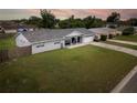 Charming single story home featuring manicured lawn, stone details, attached garage, and a well-kept lawn at 123 Jeffrey Dr, Brandon, FL 33511