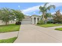 Beautiful single Gathering home with well-maintained lawn and a spacious driveway at 13334 Palmera Vista Dr, Riverview, FL 33579