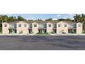 Charming townhome featuring neutral paint, a one car garage, and manicured landscaping at 31298 Paper Birch St, Wesley Chapel, FL 33545