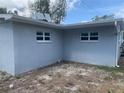 Rear exterior showcasing the home's clean lines and updated windows at 3927 Huntington Ne St, St Petersburg, FL 33703