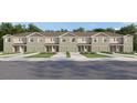 New townhomes feature an appealing exterior, individual garages, manicured lawns and sidewalks at 17265 English Chestnut Way, Land O Lakes, FL 34638