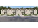 Charming townhome showcases a well-manicured lawn, inviting entrance, and private garage, creating curb appeal at 3647 Copper Beech Drive Loop, Land O Lakes, FL 34638